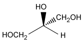 Passage Solid-phase peptide synthesis is normally carried out on a resin bathed multiple times in dimethylformamide (DMF) -a toxic, polar, aprotic solvent-which poses an environmental problem because a large amount of toxic solvent waste is created. Cyclic carbonates such as propylene carbonate (PC) and ethylene carbonate (EC) are nontoxic, polar, aprotic solvents that could be used as an alternative to DMF.Compounds <strong>1</strong> and <strong>2</strong> are modified L-amino acids. They were coupled to form Compound <strong>3</strong>, a dipeptide, which was then deprotected to yield Compound <strong>4</strong> (Figure 1) . <strong>Figure 1</strong> Synthesis of Compound <strong>4</strong>To determine the effect that solvent type and temperature have on the synthesis of this peptide, the nontoxic solvents PC and EC as well as the toxic solvent DMF were each used in separate syntheses of Compound <strong>4</strong> at different temperatures. The reaction solvent was also used to rinse the resin. Table 1 shows the results of these syntheses.<strong>Table 1</strong> Results from the Synthesis of Compound <strong>4</strong> The successful synthesis of Compound <strong>4</strong> using nontoxic solvents encouraged researchers to pursue the synthesis of a larger, biologically active peptide. Bradykinin, a vasodilator containing nine amino acids (Arg-Pro-Pro-Gly-Phe-Ser-Pro-Phe-Arg) , was synthesized using the same solid-state peptide synthesis protocol used to synthesize Compound <strong>4</strong>. Separate syntheses were done using either DMF or PC, and the purity of bradykinin from each synthesis was analyzed by high-performance liquid chromatography (HPLC) (Figure 2) .In each chromatogram, peak 1 has the same retention time as commercially obtained bradykinin, and the other peaks correspond to impurities. In chromatogram A, the impurity has a similar retention time to the product peak whereas the impurity peaks in chromatogram B have distinct retention times compared to the product peak. <strong>Figure 2</strong> HPLC of synthetic bradykinin: (A) synthesis in DMF; (B) synthesis in PC Adapted from S. B. Lawrenson et al., The greening of peptide synthesis. Green Chem. ©2017 The Royal Society of Chemistry. -The L designation of the amino acids used in peptide synthesis is based on the absolute configuration of L-glyceraldehyde. What is the structure of L-glyceraldehyde? A) B) C) D)
