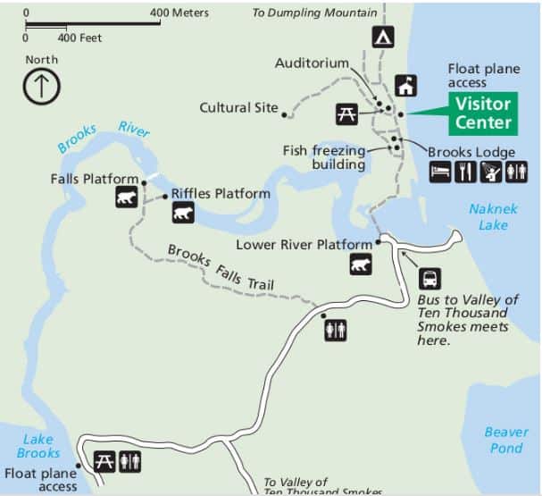 Use the map below to answer the question.   Which of the following statements is true according to the map? A) A walking trail leads to Dumpling Mountain. B) There are no places to spend the night shown. C) There are three places on the map with float plane access. D) A paved road leads to Falls Platform.