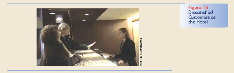 Write an email to a customer who posted negative feedback. Imagine that you work for the Colonnade Hotel and Resort, and a customer posted a video of his negative experience checking into the hotel (Figure 18). The customer also posted a negative review of the hotel on a travel website (Figure 19). Prepare an email to the customer, addressing his concerns. How can you win over this very angry customer        