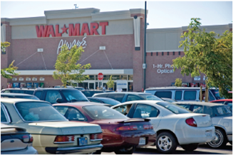 WALMART DE MEXICO By the end of 2011, one of every five Walmart stores resided south of the U.S.-Mexico border. The parent company reported annual sales of U.S.$29 billion in Mexico and opened 365 stores in 2011 alone. Walmart Stores were now Mexico's largest retailer and top privatesector employer, with over 200,000 employees. However, this unprecedented pace of expansion, driven, no doubt, by Wall Street's merciless expectations for growth, has not come without major scandal. Allegations of sophisticated accountancy schemes to avoid the payment of taxes in Mexico; numerous violations of local labor laws; and evidence of extensive bribery to facilitate store construction have undermined any positive press coverage for the economic powerhouse that is Walmart de Mexico. In April 2012, a lengthy New York Times (NYT) article by David Barstow outlined comprehensive evidence of violations of the U.S. Foreign Corrupt Practices Act (FCPA) with allegations of bribery dating back to 2005. The article claimed that the evidence had first been made available to a senior Walmart lawyer by a former Walmart de Mexico executive, who was able to document names, dates, and bribe amounts totaling more than $24 million. Given the spate of FCPA bribery scandals across a wide selection of industries from 2002 onward covered by The New York Times and other business publications, the news about Walmart wasn't a big story. What made the article so powerful was an allegation that after the Walmart attorney notified his U.S. bosses of the scandal, they elected to shut the investigation down. The 1977 FCPA legislation had never been supported with adequate investigatory resources. The act had always counted on the threat of punitive monetary fines to encourage corporations to self-disclose once evidence was uncovered and to comply promptly with any Department of Justice (DOJ) investigation. The NYT article alleged that Walmart took a different approach: Neither American nor Mexican law enforcement offi- cials were notified. None of Wal-Mart de Mexico's leaders were disciplined. Indeed, its chief executive, Eduardo Castro-Wright, identified by the former executive as the driving force behind years of bribery, was promoted to vice chairman of Wal-Mart in 2008. Walmart only notified the DOJ after it learned of the NYT investigation, and no public acknowledgment was made until after the article was published in April 2012. The article offered an explanation for the apparent reticence on the part of Walmart executives-poor stock performance and a desperate need for a positive story to counterbalance negative media coverage in the United States. The official notification to the DOJ by a designated Walmart spokesman endeavored to minimize the issue as much as possible by identifying possible problems with how [it] obtained permits, while stressing that the alleged violations were limited to discrete cases. The formal disclosure to the DOJ was supposed to represent the beginning of a period of open and constructive dialogue, during which all supporting evidence and plans for corrective action would be shared in order to facilitate the development of the appropriate fines under the FCPA guidelines. However, in a strongly worded letter to Walmart CEO Mike Duke dated August 14, 2012 (four months after the NYT article was published), Congressmen Elijah Cummings and Henry Waxman, the ranking House members of the Government Reform and Energy, Commerce, and Oversight Committees, respectively, accused the company of failing to provide any information on the bribery allegations: You have failed to provide the documents we requested, and you continue to deny us access to key witnesses. Your actions are preventing us from assessing the thoroughness of your internal investigation and from identifying potential remedial actions. In June 2012, Walmart released the results of the annual shareholder vote for its board of directors. In 2011, the board had received an average 98.4 percent support vote, based on decades of consistent financial performance. The 2012 vote, however, revealed a 13 percent vote against the reelection of CEO Mike Duke to the board, a 15.6 percent vote against former CEO Lee Scott, and a nearly 13 percent vote against Chairman Robson Walton, the son of Walmart founder Sam Walton. With nearly 50 percent of the 3.4 billion shares held by descendants of Sam Walton, there was little chance of the board members being voted out, but the dramatic increase in votes against reelection sent a clear message of dissatisfaction with the company's leadership. It remains to be seen whether the message will be heard and what the results of the FCPA investigation will be.   Is this a Walmart de Mexico problem or a Walmart corporate problem? Why?<div style=padding-top: 35px> 
