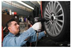 GUARANTEED HOURLY WORK Find the gross earnings for each employee by first finding the daily hourly earnings and then finding the daily piecework earnings. Each employee has an 8-hour workday and is paid $.75 for each unit of production or the hourly rate, whichever is higher. (See Example.)     EXAMPLE  Finding Earnings with a Guaranteed Hourly Wage  Quick TIP  The company guarantees that a tire installer will not earn less than $10.50 per hour or $84 1$10.50 • 82 for an 8-hour day. A tire installer at the Tire Center is paid $10.50 per hour for an 8-hour day or $1.15 per tire installed, whichever is higher. Find the weekly earnings for an employee having the following rate of production.       