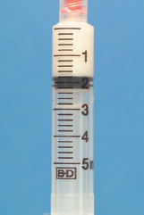 What dosages are measured on the following syringes?     _____