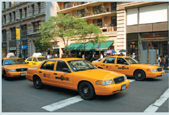 NEW YORK TAXICABS: WHERE HAVE ALL THE FARE FLAGS GONE?  Applicable Concept: perfect competition versus monopoly    Yellow taxicabs in New York City, which are today one of the most famous icons of the city, are a love and hate relationship. The upside is that you can stick your arm in the air to hail a cab that will take you to your destination. The downside is the traffic jams speckled with yellow cabs that service the city. Flash back to the 1920s, when New York taxicabs were competitive. There was no limit on the number of taxis, and hack licenses were only $10. In addition to a low barrier to entry, taxis engaged in price competition. Cabbies could choose among three different flags to attach to their cars. A red flag cab charged a surcharge for extra passengers. A white flag signaled no surcharge for extra passengers. A green flag meant the cabbie was offering a discount fare. Price wars often erupted, and the vast majority of cabbies flew green flags and charged bargain fares. One strategy was to fly the red flag (high rate) during rush hour and the green flag to offer discounts at off-peak times. Taxi companies also offered a variety of cabs-old, new, big, and small.    As years passed, the system changed because of the concern that competition was causing an overabundance of taxis that congested city streets. The solution was to create a monopoly by law in 1937 designed to limit the number of cabs by requiring all cabs accepting street hails to be painted yellow and possess a medallion on the hood of the] taxi. Currently, the Taxi and Limousine Commission (TLC) sets rates and imposes regulations. There are no price wars, and the barrier to entry is high due to the high price of medallions. Today, the aluminum badges that give the right to pick up passengers on the street cost more than $700,000, as determined at infrequent auctions. Because of their high prices, most cabs are owned by investment companies and are leased to the drivers. On the other hand, it is illegal for cabs without medallions to cruise and pick up passengers who hail them, although the law is often ignored by gypsy cabs. Nonmedallion cabs are authorized to respond only to customers who have ordered the cab in advance by phone or other means. There's no limit on the number of nonmedallion cabs or what the drivers may charge. Now there is a sharing economy with unregulated rideshares provided by companies like Uber and Lyft sporting distinctive thick pink mustaches on the front grill of personal cars. Cab companies have been up in arms, and the ridesharing business faces an uncertain landscape. For example, using green taxis New York has expanded into areas under served by yellow cabs. Use a graph to compare the price and output of medallion yellow cabs in New York City today with the taxi market before the 1920s.