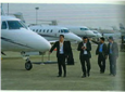Business Jet Makers Eye China1 Mike W. Peng (University of Texas at Dallas) Businessjet makers of all stripes are elbowing their way into China's virgin skies. Will China's institutions facilitate or prohibit their flights Do they have the necessary resources and capabilities to soar  The Chinese economy slows down is one of the leading themes in global business news. Foreign firms interested in the legendary one billion customers are advised to adjust their high-flying expectations down to earth. Defying this trend, business jet makers continue to have sky-high expectations for China-for a good reason. Arriving in China as recently as in 2003, this industry is literally just taking off. Business jets (also known as corporate jets or private jets) are ideal for China, which has a vast territory (the third largest in the world, behind Russia and Canada) good for flying. China has also amassed the world's second-largest number of billionaires (behind the United States) and is rapidly churning out new ones who can afford to buy jets. Yet, only fewer than 400 business jets currently fly in China, a number that is not only smaller than the number in Brazil and Mexico, but also smaller than what can be found in one single airport-Orange County airport outside Los Angeles-in the United States. Institutions The rise of China for business aviation also coincides with the aftermath of the 2008 global financial crisis, during which many buyers cancelled their orders. Not surprisingly, anybody who is somebody in business aviation is eager to elbow its way into essentially the virgin skies of China. But here is an institution-based catch. The skies in China are formally controlled by the military, and flight plans have to be submitted via a cumbersome process. Beijing's airport only gives two take-off slots an hour to business jets. Buyers importing jets are hit by onerous duties and taxes, and officials have talked about slapping a new luxury tax on top of those. Further, an anti-corruption (and anti-conspicuous consumption) campaign unleashed by President Xi Jinping has scared away a lot of large state-owned enterprises (SOEs), which used to make up approximately 15% of the business jet market in China-now down to about 5%. While institution-based barriers persist, the government has offered a glimmer of hope. It seems to have realized the value of business aviation. The latest Five- Year Plan explicitly calls for the development of nonairline aviation, and the military is instructed to give up some chunks of air space to leave room for business jets. The industry, of course, has been marketing and lobbying intensely, claiming that business aviation is not merely a luxury, but also a productivity booster that can propel firms' (and China's) growth to new heights. Resources and Capabilities Leveraging resources and capabilities, each business jet maker is endeavoring to outshine the other. Beech Hawker, Cessna, and Gulfstream of the United States, Dassault Falcon of France, and Learjet of Canada (owned by Bombardier) are the traditional competitors. Each carrying 8-12 passengers, they offer privacy, luxury, and often very long range. Salivating at the growth potential, the top three larger jet makers- Boeing, Airbus, and Embraer (of Brazil)-have also entered the fray. Boeing adapted its 737 to offer the Boeing Business Jet (up to 60 passengers). Airbus modified its A320 to launch the Airbus Corporate Jet (up Lo 40 passengers). Embraer turned its ERJ 190 regional jet into Lineage 1000 (up to 20 passengers). These ultra-large business jets offer more spacious interiors, better-circulated air (due to their larger cabin), and longer range-at price ranges competitive to those of the traditional business jets. In China, the current market leader is Gulfstream, which has sold more than 100 jets and holds the biggest market share. Gulfstream does whatever it takes to win orders, including changing the model number instead of offending potential buyers with an unintended meaning. Specifically, in July 2011, Gulfstream renamed its G250 introduced in 2008 to G280. Its website explained: As demand for Gulfstream business jets grows around the world, the move was prompted by the company's sensitivity to the varied cultures of its international customer base. While it never explained exactly why, it was because 250 means stupid or useless in some parts of China. One senior executive explained to the press that we determined that G280 is a more amenable number sequence in certain cultures. Such market-oriented efforts have been handsomely rewarded by eager Chinese customers. In April 2014 at the Asian Business Aviation Conference and Exhibition (ABACE) in Shanghai-a major industry gathering-Gulfstream signed a 60-plane deal with Minsheng Financial Leasing, the aviation-finance arm of a major private bank in China. This is not only one of the largest deals for Gulfstream, but also one of the largest worldwide. As the industry takes off, rising signs of sophistication emerge. A decade ago, the first Chinese buyers tended to pay cash and flew rarely-only to impress friends. Today's buyers often take advantage of financing or leasing (as evidenced by the Gulfstream- Minsheng deal). They fly more and endeavor to get more bang out of their bucks (or yuans). Some of them cannot wait for 1-2 years, so they have done something unthinkable for the super rich: buying usedjets. Experts estimate that in the next 20 years, demand in China will be the third largest in the world, resulting in 1,500 business jets-behind 9,500 in the United States and 4,000 in Europe. Sources: Based on (1) Airport Journal, 2013, Business jet player plans to spreads its wings in China, June: 17-49; (2) Airport Journal, 2015, Focus on ABACE 2015, May: 20-23; (3) Economist, 2014, Business aviation: Fasten seat belts, April 19; (4) South China Morning Post, 2012, Bargain hunting takes flight, July 10: A4; (5) www.abace.aero; (6) www.gulfstreamnews.com.     Why are corporate jet makers so eager to enter China