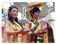 Scotch Whisky in China: A Taste of the Good Life Scotch whisky is a textbook example of a global product. Wealthy consumers with discerning palates do not hesitate to pay premium prices for top global brands such as Chivas Regal and Johnnie Walker. Moreover, Scotch drinkers everywhere associate the amber spirit with aspirational goals such as success and achievement. In the late 1990s, Diageo, the owner of the Johnnie Walker brand, launched a global advertising campaign featuring the tagline Keep walking. The theme, which was developed by Britain's Bartle Bogle Hegarty (BBH) advertising agency, was keyed to the brand's logo: a red-coated, top-hatted gentleman in mid-stride. However, as BBH staffers working on the Johnnie Walker account understood, the things that constitute achievement can vary from culture to culture. In China, for example, the self-satisfaction that goes along with achieving a goal may not be enough; acknowledgment of the achievement by peers is also important. For this reason, BBH created a localized marketing campaign for China. One ad depicts two golfers hitting increasingly extreme shots, which include teeing off from the roof of a golf cart and a ball that is hit from underneath a crocodile. The campaign coincided with rapid market growth; after China joined the World Trade Organization (WTO) in 2001, tariffs on spirits imports were cut from 65 percent to 10 percent. According to the Scotch Whisky Association, total Scotch exports to China totaled £80 million in 2009, up from just £1.5 million in 2001. Today, Johnnie Walker has a 34 percent share of China's whisky market. BBH's Orlando Hooper-Greenhill explained the insights that were incorporated into the campaign: Johnnie Walker's marketing in China needed to reflect the importance of peer group and family perceptions of an individual's achievements, while also accommodating the fact that whisky is a youthful drink. Hooper-Greenhill also noted that in China, whisky is consumed in a wider variety of settings than in the West. In Hooper-Greenhill's words, Different messages were needed to reflect the different environments in which whisky is consumed, and for more and less urbanized areas. Exhibit 13-7 As noted throughout the text, global products and brands often compete with local ones. In China, Johnny Walker Scotch competes with Maotai, a fragrant clear liquor that is associated with the southwestern province of Gui Zhou. Maotai is packaged in a fancy box with a glass bottle inside. Alcohol is the gift that Chinese take when visiting friends. Depending on the quality, a single bottle of Maotai can cost anywhere from $25 to more than $1,000. Source: STR/AFP Newscom.   Market segmentation is an integral part of Diageo's approach to the Chinese market. As Kenneth MacPherson, managing director for Diageo China, noted, The size of the market and the complex demographic composition leads to totally different consumption habits and patterns in different parts of China. The first segment, guanxi men, are status-driven businessmen ages 35 to 45 who spend a great deal of time networking and trying to set up business deals. The second segment is strong independent women, also in the 35- to 45-age bracket. A third segment is composed of upwardly mobile men and women ages 25 to 35 who want to be seen as cutting-edge. Finally, the choice generation consists of those in their twenties who seek out new experiences. Although Johnnie Walker has achieved great success in China, the brand is in second place behind Chivas Regal, which commands a 50 percent market share. For decades, Chivas enjoyed a global reputation as the deluxe Scotch whisky. As was the case with Johnnie Walker, the brand's promotional strategy also frequently called for global advertising campaigns. For example, in the early 1990s a print campaign was keyed to the slogan There will always be a Chivas Regal. The campaign featured a series of universal images and was translated into 15 languages. Managers in each of 34 countries were authorized to choose individual ads from the campaign that they deemed appropriate for their markets. In 2000, France's Pernod Ricard SA acquired the Chivas Regal brand from Seagram. Between 2000 and 2002, Chivas experienced a 10 percent overall decline in sales volume, while Johnnie Walker posted a 12 percent gain. Prior to the acquisition, Pernod Ricard was best known for Ricard, an anise-flavored beverage known as pastis. Some industry observers questioned whether a company that had focused on so-called second tier local brands had the marketing skills to reinvigorate a truly global brand such as Chivas. As one analyst put it, Pernod Ricard was a very big French company that has joined the big time. Now they're taking on the big global brands, which requires different skills. The question is, do they have the skills that it takes? Patrick Ricard, who was chairman of Ricard from 1978 until his death in 2012, was confident that the management team at Pernod Ricard did have the skills required to succeed in the global marketplace against giants such as Diageo. For one thing, the company's decentralized strategy is well matched to an industry sector characterized by local tastes. Unlike Diageo, Ricard passed over British advertising agencies in favor of TBWA Paris. Impact, an industry trade magazine, observed that When you know, the enigmatic slogan developed for Seagram's final Chivas advertising campaign, was utterly ineffective. As Martin Riley, Ricard's chief marketing officer, explained, When you get to a lot of countries that are not primarily English-speaking, like those in Asia or South America, they would like you to fill in the dots. A new slogan, This is the Chivas Life, was designed to appeal to the aspirations of Chivas drinkers throughout the world. In China, the tagline This is the Chivas Life was replaced in 2005 by This is the Chivas Party Experience. TEQUILA/China, the agency that developed the theme, wanted to target more cosmopolitan, affluent young adults. The agency's research indicated an aspiration for I eisure and travel. The agency thus developed a communication program centered on a series of parties that were staged in Shanghai, Beijing, and other key cities. Each party had a distinct theme; one was dubbed Chivas 2070 Futuristic Life, while another was called Chivas Life 70s Psychedelic Disco Fever. Partygoers could sample Chivas cocktails, enjoy fashion makeovers, and listen to cutting-edge music. By 2008, with the global economy starting its downward spiral, Pernod's research yielded insights into a subtle shift in consumer sentiment. As CMO Riley noted, People are questioning a certain level of values that have taken the world to where it is right now...the individual getting ahead at any price. The research results led to a new campaign in China with the tagline Live with Chivalry. The creative strategy taps into Chivas' European heritage and the code of conduct practiced by knights. The themes of brotherhood, freedom, gallantry, honor, and loyalty figure prominently in the ads, which are also being run globally. One execution shows a man in a business suit walking on a crowded city street; the voiceover says, Millions of people, everyone out for themselves. Can this really be the only way? The spot then switches to images of men skydiving and mounted on horses. Here's to honor, and to gallantry, long may it live. Here's to doing the right thing, to giving a damn. What strategies should Diageo, Pernod-Ricard, and other Western spirits brands pursue in China?<div style=padding-top: 35px> 