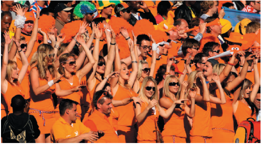 Ambush Strategy The definition of ambush marketing as a marketing strategy is when a competing brand connects itself with a major sporting event without paying a sponsorship fee. Ambush marketing occurs when one brand pays to become an official sponsor of an event and another competing brand attempts to cleverly connect itself with the event without paying the sponsorship fee and without breaking any laws. FIFA (the International Federation of Association Football) is adamant about the protection of its sponsors and their legal resources and has the wherewithal to defend and enforce its rights and fulfill its commitment to tournament sponsors. FIFA is considering legal action against a Dutch brewery it accuses of using women fans to advertise its beer at the World Cup. Stewards ejected 36 Dutch supporters during the match between the Netherlands and Denmark midway through the second half in Johannesburg. All were dressed identically in tight-fitting, short orange dresses sold as part of a gift pack by a Dutch brewery. A brewery representative dismissed FIFA's concerns as ridiculous. The World Cup's authorized beer, Budweiser, has paid millions of dollars for the privilege of being its sponsor. With a large chunk of FIFA's revenue coming from selling marketing rights, it vigorously pursues anyone who tries to associate themselves with the World Cup without paying the tournament for those marketing rights. What seems to have happened is that there was a clear ambush marketing activity by a Dutch brewery company, said a FIFA spokesman. No charges have been filed against the ejected orange-clad Dutch supporters, FIFA said in an e-mailed statement. The World Cup generated $1.6 billion in sponsorship revenue from 2007 to 2010. The weak economy has led some companies to turn to ambush marketing at sporting events as a way to get their message out in a less costly manner and successfully avoid sponsorship fees.     Crowd shot of Dutch women wearing orange dresses during the World Cup 2010, appearing to support a Dutch brewery, which was not the official sponsor of the Cup. FIFA does not have the monopoly on orange, and people have the freedom to wear what they want. Why?