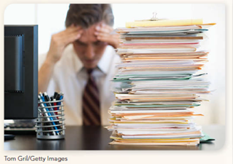 KNOW RIGHT FROM WRONG I even feel guilty now taking time to watch my daughter play soccer on Saturday mornings.  Help! I've Been Flattened into Exhaustion      Dear Stress Doctor: My boss came up with the great idea of laying off some managers, assigning more workers to those of us who haven't been laid off, and calling us coaches instead of supervisors. She says this is all part of a new management approach to operate with a flatter structure and more empowerment. For me this means a lot more work coordinating the activities of 17 operators instead of the 6 that I previously supervised. I can't get everything cleaned up on my desk most days, and I end up taking a lot of work home. As my organization restructures and cuts back staff, it puts a greater burden on the rest of us. We get exhausted, and our families get short-changed and angry. I even feel guilty now taking time to watch my daughter play soccer on Saturday mornings. Sure, there's some decent pay involved, but that doesn't make up for the heavy price in terms of lost family time. But you know what My boss doesn't get it. I never hear her ask: Camille, are you working too much Don't you think it's time to get back on a reasonable schedule  No! What I often hear instead is Look at Andy; he handles our new management model really well, and he's a real go-getter. I don't think he's been out of here one night this week before 8 pm. What am I going to do, just keep it up until everything falls apart one day Is a flatter structure with fewer managers always best Am I missing something here with the whole new management  Sincerely, Overworked in Cincinnati WHAT DO YOU THINK  Is it ethical to restructure, cut management levels, and expect remaining managers to do more work Or is it simply the case that managers used to the old ways of doing things need extra training and care while learning new management approaches What about this person's boss-is she on track with her management skills Aren't managers supposed to help people understand their jobs, set priorities, and fulfill them, while still maintaining a reasonable work-life balance