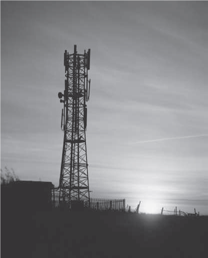 Multigenerational Effects of Ozone Depletion and Greenhouse Gases 12  The long-term effects of ozone depletion from hydrochlorofluorocarbon (HCFC) emissions and of CO₂ and other greenhouse gases from the burning of fossil fuels are controversial. Environmental scientists insist that the release of HCFCs opened a gaping hole in the ozone shield that provides protection from the sun's ultraviolet (UV) rays. More recently, some scientists have argued that the increasing concentration of greenhouse gases has raised global temperatures. What is less controversial is that these environmental events have massive consequences for human health and wealth. Increasing incidence of skin cancers, melting polar icecaps, and rising sea levels imply tangible losses of catastrophic proportions-perhaps many billions of dollars annually. Some of these losses are immediate, but others are perhaps 100 years off. Benefit-cost analysis normally considers projects no more than 20 to 30 years long and employs discount rates of 2 to 8 percent. How should one discount such an uncertain and distant future as is involved in ozone depletion and greenhouse gases Assuming a constant discount rate equal to the rate of return on long-term government bonds (5.43 percent), the discount factor that should be applied to find the present value of projected benefits or losses avoided in year 100 would be (1/1.057 100 ) = 0.003913 or $3,913,780 present value per billion dollars of future losses avoided in year 100. Notice what happens, however, if uncertainty about the appropriate discount rate varies from 2 to 8 percent. The discount factor at 100 years would then vary from (1/1.02 100 ) = 0.13803 or $138,032,967 per billion dollars for 2 percent, to as little as (1/1.08 100 ) = 0.000454, or $454,595 per billion dollars for 8 percent. The possibility of lower discount rates implies that more than $138 million dollars should be spent today to avoid the projected $1 billion in delayed damage 100 years from now! Of course, the higher 8 percent rate implies spending less than one-half a million to avoid the $100 billion future loss. This range of present value estimates from $138 million to $454,595 is beyond what any analyst can work with in doing sensitivity analysis. What should a benefit-cost analyst conclude And what should businesses whose cash flows depend on fun in the sun recreation like golf courses and theme parks and beachside hotels or physical assets built near sea level like the New York and Shanghai business districts conclude about the justifiable capital expenditure to slow down or reverse global warming  One insight is that it is not the 5 percent average discount rate between 2 and 8 percent that matters in such circumstances, just as the average depth of a pool does not determine the hazard to someone who cannot swim. Instead, the lowest applicable discount rate largely determines the present value of very distant cash flows because higher-discount-rate scenarios like 7 and 8 percent inevitably sum to essentially zero at 100 years. Martin Weitzman has calculated what discount rate is implied by assuming the discount rate begins at 4 percent and then follows a random path with equiprobable higher and lower rates and a standard deviation of 3 percent. The results led him to recommend a sliding-scale discount rate of 2 percent for 25- to 75-year and 1 percent for 76- to 300-year cash flows. The fact that lower discount rates have such dramatically nonsymmetrical effects on present value when very distant benefits are involved means that the present value of reducing CO₂ emissions and other greenhouse gases may be much higher than previously thought. As decision makers worldwide consider the options for reducing greenhouse gases (CO₂ , methane, nitrous oxide, etc.), one glaring fact surfaces quickly. The U.S. Energy Information Administration estimates that 41 percent of all the CO₂ emissions we generate in the United States come from electricity generation, and 83 percent of that comes from burning coal (see Figure). So, 34 percent (0.41 × 0.83) of all U.S. CO₂ emissions comes from coal-fired power plants. Not surprisingly, much interest in preventing global warming has therefore centered on alternative sources of electrical energy generation. The popular inequality RE  FIGURE Greenhouse Gas Emissions in the United States     What exactly are the alternative sources of electrical energy Wind power, solar power, biomass, hydro, biofuel, geothermal, and ocean tidal power all contain some attractive common features for the United States. They are renewable resources in abundant local supply with low carbon footprints. At present, only 5 percent of electrical generation comes from all these alternative energy sources rather than coal (83 percent), natural gas (15 percent), or negligible fuel oil (again see Figure 17.3). Natural gas is now much cheaper today than coal per British thermal unit (BTU), but its carbon footprint (though 80 percent cleaner than coal) is still quite substantial. Rather than spending almost $1 billion a day in net wealth transfer for foreign crude oil, Americans now perceive that natural gas is their most plentiful energy resource. Indeed, at present rates of consumption, the United States has more proven reserves of coal (100 years) and natural gas (110 years' worth) than Saudi Arabia has proven reserves of oil (85 years).     But 1 ton of coal generates a megawatt of electricity plus 1 ton of CO₂ byproduct. The marginal cost for delivered coal has varied from $45 to $82 per ton in 2007-2012, and the electricity is worth from $0.06/kWh in Washington state to $0.12/kWh in New York state. Taking the 2013 cost of coal ($88) and the weighted average value of electricity across the United States ($0.11), the electrical generation industry pays $80 per ton for coal on the spot market and produces a $110 megawatt of electricity. The problem is that when one includes the market cost of a ton of CO₂ byproduct, using the 2013 price of the CO₂ emission trading contract in the European Union (EU) of $10, 13 a typical public utility in the United States must recover all its capital cost from the remaining tiny $12 operating profit ($110 - $88 - $10 = $12) per megawatt hour. Even a giant 500-megawatt U.S. power plant would therefore project (under a capand- trade carbon emissions trading regime) net cash flow of only $6,000 per hour for perhaps 20 hours a day or $120,000 per day to recover capital equipment costs and earn a profit. That sums to $42 million per year, sufficient at a 5% CoC to generate only $840 million present value of the net cash flow against the $900 million net investment of a 500-megawatt coal-fired power plant plus smokestack scrubbers, even if the cash flows last 50 years. The way forward is natural gas (NG) production, which has exploded in the United States, resulting in an 84 percent reduction in its equilibrium price, now half the cost of coal per BTU. Which is more likely to be adopted a) an optimal carbon tax of 7% higher electricity cost and 2% higher gasoline costs or b) a cap and trade carbon emission trading system Why