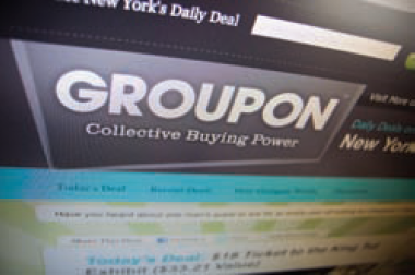On January 20, 2011, many online consumers were presented with a deal that at face value might sound too good to be true. Recipients registering at the site could pay $10 and receive a $20 Amazon gift card. And if that alone wasn't motive enough, LivingSocial threw out a further incentive: If a buyer got three friends to purchase the deal as well, he or she would receive the gift card for free. Many savvy consumers in fact would probably already be familiar with sites like LivingSocial and the deals it offers. As the second largest online deal-a-day Web site, LivingSocial is one of numerous similar start-up sites playing catch-up to market leader Groupon. The model for such Web sites is relatively straightforward, as they function roughly as marketing vehicles for local small businesses, generating publicity and facilitating transactions. The site, say Groupon, would initiate coupon offerings geographically (based on city) by working out deals with local retailers, restaurants, and other businesses. Discounts can be significant, ranging from 50 percent to as much as 90 percent off. Businesses would sell the coupons to consumers directly, and as the go-between, Groupon would take a cut, usually about 30 percent after the discount. So how does a $20 Amazon gift card for $10 fit into the equation, especially since Amazon wouldn't exactly qualify as a small local business? As an added twist, LivingSocial and Amazon decided to forgo the typical sales arrangement; LivingSocial purchased the gift cards from Amazon and sold them directly. And although the terms of the exchange were not disclosed, if LivingSocial purchased them at face value, it would certainly absorb the losses itself. But if LivingSocial takes such a heavy loss on the deal, how would Amazon justify the $175 million investment it made in LivingSocial in December 2010, just before the gift card offer? The answer lies within the 1.3 million coupons LivingSocial managed to sell through the promotion, which beat the $11 million in sales that rival Groupon generated when it offered a similar national deal with Gap. Prior to the deal, LivingSocial-valued at an estimated $1 billion-had 17 million members prior to offering the deal compared to the 50 million subscribers of Groupon, which had recently turned down a $6 billion offer from Google. Now compare the 1.3 million Amazon gift cards to the average number of coupons that Groupon sold per deal over the first quarter of 2010. At only 1,848, it becomes pretty clear that national deals like Groupon's Gap coupon and the Amazon gift cards are not about driving sales for Gap and Amazon, nor are they about profitability. They're about driving sales volume, increasing name exposure, and pulling in new members. According to Caris Company analyst Sandeep Aggarwal, These companies are in a land grabbing stage; the more members they sign up, the better deals they bring in. It clearly helps them generate higher revenue. So for a company like LivingSocial trying to play catch-up to market leader Groupon, a high-profile national deal like the Amazon offer makes sense. In December 2010, Groupon held a commanding lead over other group coupon sites in terms of its share of total U.S. site visits, leading second place LivingSocial by almost a full order of magnitude (0.033 percent to 0.0036 percent). This land grab stage becomes increasingly important as there is clearly still room to grow. From Q4 of 2009 to Q1 of 2010, Groupon saw significant growth in nearly every major sales metric, from average buyers per deal (111 percent), to average deal price ($27.20 to $38.36), to average gross per sale (102 percent). Unique visitors rose from 900,000 in September 2009 to three million in March 2010. So while Groupon may have a huge head start, other companies can still find deals to attract significant attention. Barriers to entry remain low, with minimal existing technological advantages and little preventing local vendors or buyers form using multiple platforms. And as neither Groupon nor LivingSocial have reported seeing subscriber fatigue from receiving daily deal advertisements, the distribution model remains viable. How long this will last, however, is an entirely different question, making moves to grab subscribers (such as LivingSocial's Amazon deal) all the more important. Which pricing objective was Living Social adopting with its Amazon gift card offer?