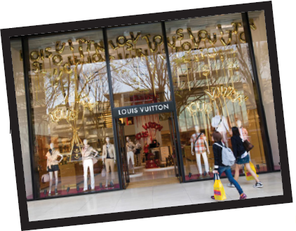 Louis Vuitton     Louis Vuitton (LV) is one of the world's most legendary brands and is synonymous with images of luxury, wealth, and fashion. The company is known for its iconic handbags, leather goods, shoes, watches, jewelry, accessories, and sunglasses, and is the highest-ranked luxury brand in the world. It was 1854 when Louis Vuitton opened his first store in Paris and sold handmade, high-quality trunks and luggage. In the late 19th century, Vuitton introduced his signature Damier and Monogram Canvas materials, featuring the famous design still used in most of the company's products today. Throughout the 20th century, the company that carries his name continued to grow internationally, expanding into the fashion world by the 1950s and reaching $10 million in sales by 1977. In 1987, Louis Vuitton merged with Moët et Chandon and Hennessy, leading manufacturers of champagne and cognac, and created LVMH, a luxury goods conglomerate. Louis Vuitton's products are made with state-ofthe- art materials, and its designers use a combination of art, precision, and craftsmanship to produce only the finest products. The legendary LV monogram appears on all the company's products and stands for the highest quality, premium status, and luxury travel. Over the years, however, counterfeiting has become a huge problem and one of Louis Vuitton's most difficult challenges. Louis Vuitton is one of the most counterfeited brands in the world, and the company takes the problem very seriously because it feels that counterfeits dilute its prestigious brand image. Louis Vuitton employs a full team of lawyers and fights counterfeiting in a variety of ways with special agencies and investigative teams. Until the 1980s, Louis Vuitton products were available in a wide variety of department stores. However, to reduce the risk of counterfeiting, the company now maintains tighter control over its distribution channels. Today, it sells its products only through authentic Louis Vuitton boutiques located in upscale shopping areas and highend department stores, all run independently with their own employees and managers. Louis Vuitton prices are never reduced, and only recently did the company start selling through louisvuitton.com in hopes of reaching new consumers and regions. Over the years, a wide variety of high-profile celebrities and supermodels have used LV products, including Madonna, Audrey Hepburn, and Jennifer Lopez. In its marketing efforts, the company has used high-fashion celebrities, billboards, print ads, and its own international regatta-the Louis Vuitton Cup. Recently, LV broke tradition and featured nontraditional celebrities such as Steffi Graf, Mikhail Gorbachev, Buzz Aldrin, and Keith Richards in a campaign entitled Core Values. LV also launched its first television commercial focused on luxury traveling rather than fashion and has formed new partnerships with international artists, museums, and cultural organizations in hopes of keeping the brand fresh. That said, Louis Vuitton still spends up to 60 hours making one piece of luggage by hand-the same way it did 150 years ago. Today, Louis Vuitton holds a brand value of $26 billion according to Forbes and is ranked the 17th most powerful global brand according to Interbrand. The company is focused on expanding its luxury brand into growing markets such as China and India as well as continuing to grow in strong markets like Japan and Europe. It also continues to add new product lines to its portfolio.. Is the counterfeiting of Louis Vuitton always a negative? Are there any circumstances where it can be seen as having some positive aspects?