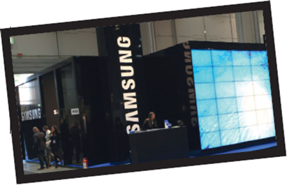 Samsung     Korean consumer electronics giant Samsung has made a remarkable transformation, from a provider of valuepriced commodity products that original equipment manufacturers (OEMs) sold under their own brands, to a global marketer of premium-priced Samsung-branded consumer electronics such as flat-screen TVs, digital cameras, digital appliances, semiconductors, and cell phones. Samsung's high-end cell phones have been a growth engine for the company, which has also released a steady stream of innovations, popularizing the PDA phone, the first cell phone with an MP3 player, and the first Blu-ray disc player. Samsung initially focused on volume and market domination rather than profitability. However, during the Asian financial crisis of the late 1990s, when other Korean chaebols collapsed beneath a mountain of debt, Samsung took a different approach. It cut costs and reemphasized product quality and manufacturing flexibility, which allowed its consumer electronics to go from project phase to store shelves within six months. Samsung invested heavily in innovation and focused intently on its memory-chip business, which established an important cash cow and rapidly made the company the largest chip maker in the world. The company continued to pour money into R D during the 2000s, budgeting $40 billion for 2005-2010. Its focus on R D and increasing digital convergence have let Samsung introduce a wide range of electronic products under its strong brand umbrella. The firm also partnered with longtime market leader Sony to create a $2 billion state-of-the-art LCD factory in South Korea and signed a milestone agreement to share 24,000 basic patents for components and production processes. Samsung's success has been driven not only by successful product innovation, but also by aggressive brand building over the last decade. From 1998 to 2009, the company spent over $7 billion in marketing, sponsored six Olympics, and ran several global ad campaigns themed Imagine, Quietly Brilliant, and YOU, all which included brand messages such as technology, design, and sensation (human). In 2005, Samsung surpassed Sony in the Interbrand brand ranking for the first time and continues to outperform Sony today. The economic downturn during 2008 and 2009 significantly affected the semiconductor industry, overall consumer electronics sales, and Samsung's bottom line. To survive, Samsung slashed profit margins, decreased production, and cut inventories. As a result, the company emerged at the end of 2009 with record-high quarterly profits despite significantly smaller profit margins. Today, Samsung is the global leader in flat-panel TVs and memory chips, and the number two player in mobile phones. It is focused on growing technologies such as smart phones and has partnered with both Microsoft's Windows Mobile and Google's Android software. In addition, Samsung has formed a green partnership with Microsoft to help create energy-efficient computers. Unlike rival firms, Samsung has become a global leader by making both components for electronics products and the actual devices sold to consumers, and without acquiring major competitors. It has more than doubled its employees from a decade ago to over 164,000 around the world. With record sales of $110 billion in 2008, the company's CEO, Lee Yoon-woo, announced the firm hopes to hit $400 billion in revenue by the year 2020. To accomplish this aggressive goal, Samsung will explore areas like health care and home energy products. What are some of Samsung's greatest competitive strengths?