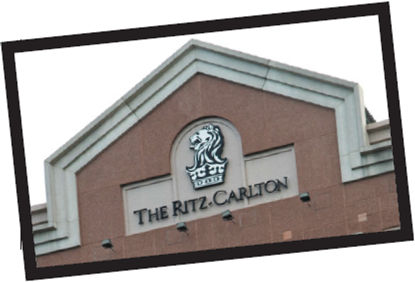 The Ritz-Carlton     Few brands attain such a high standard of customer service as the luxury hotel, The Ritz-Carlton. The Ritz- Carlton dates back to the early 20th century and the original Ritz-Carlton Boston, which revolutionized the way U.S. travelers viewed and experienced customer service and luxury in a hotel. The Ritz-Carlton Boston was the first of its kind to provide guests with a private bath in each guest room, fresh flowers throughout the hotel, and an entire staff dressed in formal white tie, black tie, or morning coat attire. In 1983, hotelier Horst Schulze and a four-person development team acquired the rights to the Ritz-Carlton name and created the Ritz-Carlton concept as it is known today: a company-wide concentration on both the personal and the functional side of service. The five-star hotel provides impeccable facilities but also takes customer service extremely seriously. Its credo is, We are Ladies and Gentlemen serving Ladies and Gentlemen. According to the company's Web site, The Ritz-Carlton pledge(s) to provide the finest personal service and facilities for our guests who will always enjoy a warm, relaxed, yet refined ambience. The Ritz-Carlton fulfills this promise by providing impeccable training for its employees and executing its Three Steps of Service and 12 Service Values. The Three Steps of Service state that employees must use a warm and sincere greeting always using the guest's name, anticipate and fulfill each guest's needs, and give a warm good-bye again using the guest's name. Every manager carries a laminated card with the 12 Service Values, which include bullets such as number 3: I am empowered to create unique, memorable and personal experiences for our guests, and number 10: I am proud of my professional appearance, language and behavior. Simon Cooper, the company president and chief operating officer, explained, It's all about people. Nobody has an emotional experience with a thing. We're appealing to emotions. The Ritz-Carlton's 38,000 employees at 70 hotels in 24 countries go out of their way to create unique and memorable experiences for their guests. While The Ritz-Carlton is known for training its employees on exceptional customer service, the hotel also reinforces its mission and values to its employees on a daily basis. Each day, managers gather their employees for a 15-minute line up. During this time, managers touch base with their employees, resolve any impending problems, and spend the remaining time reading and discussing what The Ritz-Carlton calls wow stories. The same wow story of the day is read to every single employee around the world. These true stories recognize an individual employee for his or her outstanding customer service and also highlight one of the 12 Service Values. For example, one family staying at the Ritz-Carlton, Bali, needed a particular type of egg and milk for their son who suffered from food allergies. Employees could not find the appropriate items in town, but the executive chef at the hotel remembered a store in Singapore that sold them. He contacted his mother-in-law, who purchased the items and personally flew them over 1,000 miles to Bali for the family. This example showcased Service Value 6: I own and immediately resolve guests' problems. In another instance, a waiter overheard a man telling his wife, who used a wheelchair, that it was too bad he couldn't get her down to the beach. The waiter told the maintenance crew, and by the next day they had constructed a wooden walkway down to the beach and pitched a tent at the far end where the couple had dinner. According to Cooper, the daily wow story is the best way to communicate what we expect from our ladies and gentlemen around the world. Every story reinforces the actions we are looking for and demonstrates how each and every person in our organization contributes to our service values. As part of company policy, each employee is entitled to spend up to $2,000 on a guest to help deliver an anticipated need or desire. The hotel measures the success of its customer service efforts through Gallup phone interviews, which ask both functional and emotional questions. Functional questions ask How was the meal? Was your bedroom clean? while emotional questions uncover a sense of the customer's well-being. The Ritz- Carlton uses these findings as well as day-to-day experiences to continually enhance and improve the experience for its guests. In less than three decades, The Ritz-Carlton has grown from 4 locations to over 70 and earned two Malcolm Baldrige Quality Awards-the only company ever to win the prestigious award twice. How does The Ritz-Carlton match up to competitive hotels? What are the key differences?