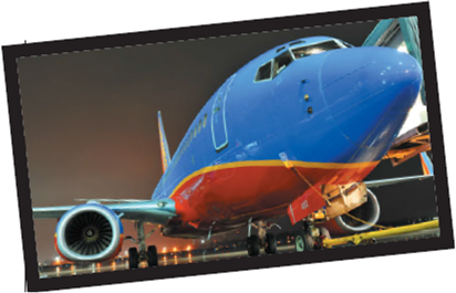 Southwest Airlines     Southwest Airlines entered the airline industry in 1971 with little money but lots of personality. Marketing itself as the LUV airline, the company featured a bright red heart as its first logo and relied on outrageous antics to generate word of mouth and new business. Flight attendants in red-orange hot pants served Love Bites (peanuts) and Love Potions (drinks). As Southwest grew, its advertising showcased its focus on low fares, frequent flights, on-time arrivals, top safety record, and how bags fly free. Throughout all its communication efforts, Southwest uses humor to poke fun at itself and convey its warm, friendly personality. One TV spot showed a small bag of peanuts with the words, This is what our meals look like at Southwest Airlines.... It's also what our fares look like. Its ongoing Wanna Get Away? campaign uses embarrassing situations to hit a funny bone with consumers. And its tagline: Ding! You are now free to move around the country is a self-parody of its in-flight announcements. This lighthearted attitude carries over to the entertaining on-board announcements, crews that burst into song in the terminal, and several personalized aircrafts, including three painted as flying killer whales, Lone Star One painted like the Texas flag, and Slam Dunk One, symbolizing the airline's partnership with the NBA. Southwest's business model is based on streamlining its operations, which results in low fares and satisfied consumers. The airline takes several steps to save money and passes the savings to customers through low fares. It flies over 3,100 short, point-to-point trips in a day-shuttling more passengers per plane than any other airline. Each aircraft makes an average of 6.25 flights a day, or almost 12 hours each day. Southwest can accomplish such a feat because it avoids the traditional hub-and-spoke system and has extremely fast turnaround service. In its early years, it turned planes around in less than 10 minutes. Today, its turnaround averages 20 to 30 minutes-still the best in the industry and half the industry average. Southwest's unique boarding process helps. Instead of assigned seating, passengers are assigned to one of three groups (A, B, C) and a number when they check in. The number refers to where they stand in line at the gate. Group A boards first, and once on board, passengers may sit anywhere they like. Southwest grows by entering new markets other airlines overprice and underserve. The company believes it can bring fares down by one-third to one-half whenever it enters a new market, and it expands every market it serves by making flying affordable to people who could not afford it before. Southwest currently serves 68 cities in 35 states, usually secondary cities with smaller airports that have lower gate fees and less congestion-another factor that leads to faster turnaround and lower fares. Another unique cost savings strategy is Southwest's decision to operate Boeing 737s for all its flights. This simplifies the training process for pilots, flight attendants, and mechanics, and management can substitute aircraft, reschedule flight crews, or transfer mechanics quickly. Jet fuel is an airline's biggest expense. According to the industry's trade group, Air Transport Association, jet fuel now accounts for 40 percent of an airplane ticket versus 15 percent just eight years ago. Southwest's biggest cost savings technique and competitive advantage has long been its program to hedge fuel prices by purchasing options years in advance. Many of its longterm contracts allow the airline to purchase fuel at $51 per barrel, a significant savings especially during the oil shocks of the 2000s that drove oil past $100 per barrel. Analysts estimate that Southwest has saved more than $2 billion with fuel hedging. Because lighter planes use less fuel, Southwest makes its planes lighter by, for instance, power-washing their jet engines to remove dirt each night. It carries less water for bathrooms and has replaced its seats with lighter models. Southwest consumes approximately 1.5 billion gallons of jet fuel each year so every minor change adds up. The airline estimates that these changes saved $1.6 million in fuel costs over just three months. Southwest has pioneered services and programs such as same-day freight service, senior discounts, Fun Fares, and Ticketless Travel. It was the first airline with a Web site, the first to deliver live updates on ticket deals, and the first to post a blog. Despite its reputation for low fares and no-frills service, Southwest wins the hearts of customers. It consistently ranks at the top of lists of customer service for airlines and receives the lowest ratio of complaints per passenger. Southwest has been ranked by Fortune magazine as the United States' most admired airline since 1997, the fifth-most admired corporation in 2007, and one of the top five best places to work. Its financial results also shine: the company has been profitable for 37 straight years. It has been the only airline to report profits every quarter since September 11, 2001, and one of the few with no layoffs amid a travel slump created by the slow economy and the threat of terrorism. Although the hot pants are long gone, the LUVing spirit remains at the heart of Southwest. The company's stock symbol on the NYSE is LUV, and red hearts can be found across the company. These symbols embody the Southwest spirit of employees caring about themselves, each other, and Southwest's customers. Our fares can be matched; our airplanes and routes can be copied. But we pride ourselves on our customer service, said Sherry Phelps, director of corporate employment. That's why Southwest looks for and hires people who generate enthusiasm. In fact, having a sense of humor is a selection criterion it uses for hiring. As one employee explained, We can train you to do any job, but we can't give you the right spirit. And the feeling is reciprocated. When Southwest needed to close reservation centers in three cities in 2004, it didn't fire a single employee but rather paid for relocation and commuting expenses.  Southwest has mastered the low-price model and has the financial results to prove it. Why don't the other airlines copy Southwest's model?