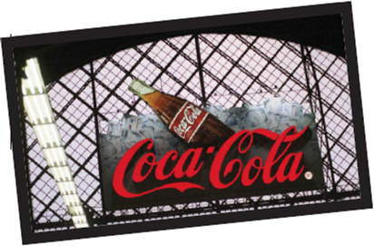 Coca-Cola     When it comes to mass marketing, perhaps no one does it better than Coca-Cola. Coke is the most popular and best-selling soft drink in history. With an annual marketing budget of nearly $3 billion and annual sales exceeding $30 billion, the brand tops the Interbrand ranking year after year. Today, Coca-Cola holds a current brand value of $68 billion and reaches consumers in over 200 countries, making it the best-known product in the world. In fact, Coca-Cola is such a global phenomenon that its name is the second-most understood word in the world (after okay ). The history of Coke's success is astonishing. The drink was invented in 1886 by Dr. John S. Pemberton, who mixed a syrup of his own invention with carbonated water to cure headaches. The company's first president later turned the product into a pop culture phenomenon by introducing it to pharmacists and consumers around the world and handing out clocks, posters, and other paraphernalia with the Coca-Cola logo. Coca-Cola believed early on that to gain worldwide acceptance, the brand needed to connect emotionally and socially with the masses, and the product needed to be within arm's-length of desire. So the company focused on gaining extensive distribution and worked hard at making the product loved by all. In World War II, it declared that every man in uniform gets a bottle of Coca- Cola for 5 cents, wherever he is, and whatever it costs the company. This strategy helped introduce the soft drink to people around the world as well as connect with them positively in a time of turmoil. Why is Coca-Cola so much bigger than any other competitor? What Coke does better than everyone else is create highly current, uplifting global campaigns that translate well into different countries, languages, and cultures. Coke's advertising over the years has primarily focused on the product's ability to quench thirst and the brand's magical ability to connect people no matter who they are or how they live. Andy Warhol said it best, A Coke is a Coke and no amount of money can get you a better Coke than the one the bum on the corner is drinking. One of Coca-Cola's most memorable and successful commercials was called Hilltop and featured the song, I'd like to buy the world a Coke. Launched in 1971, the ad featured young adults from all over the world sharing a happy, harmonious moment and common bond (drinking a Coke) on a hillside in Italy. The commercial touched so many consumers emotionally and so effectively showed the worldwide appeal of Coke that the song became a top ten hit single later that year. Coca-Cola's television commercials still touch upon the message of universal connection over a Coke, often in a lighthearted tone to appeal to a young audience. In one spot, a group of young adults sit around a campfire, playing the guitar, laughing, smiling, and passing around a bottle of Coke. The bottle reaches a slimy, one-eyed alien who joins in on the fun, takes a sip from the bottle, and passes it along. When the next drinker wipes off the slime in disgust, the music stops suddenly and the group stares at him in disappointment. The man hesitantly hands the bottle back to the alien to get re-slimed and then drinks from it, and the music and the party continue in perfect harmony. Coca-Cola's mass communications strategy has evolved over the years and today mixes a wide range of media including television, radio, print, online, in-store, digital, billboard, public relations, events, paraphernalia, and even its own museum. The company's target audience and reach are so massive that choosing the right media and marketing message is critical. Coca-Cola uses big events to hit huge audiences; it has sponsored the Olympics since 1928 and advertises during the Super Bowl. Red Coke cups are placed front and center during top-rated television shows like American Idol , and the company spends over $1 billion a year on sports sponsorships such as NASCAR and the World Cup. Coca- Cola's global campaigns must also be relevant on a local scale. In China, for example, Coca-Cola has given its regional managers control over its advertising so they can include appropriate cultural messages. The delicate balance between Coca-Cola's local and global marketing is crucial because, as one Coca-Cola executive explained, Creating effective marketing at a local level in the absence of global scale can lead to huge inefficiencies. In 2006, for example, Coca-Cola ran two campaigns during the FIFA World Cup as well as several local campaigns. In 2010, the company ran a single campaign during the same event in over 100 markets. Executives at Coca-Cola estimated that the latter, more global strategy saved the company over $45 million in efficiencies. Despite its unprecedented success over the years, Coke is not perfect. In 1985, in perhaps the worst product launch ever, Coca-Cola introduced New Coke-a sweeter concoction of the original secret formula. Consumers instantly rejected it and sales plummeted. Three months later, Coca-Cola retracted New Coke and relaunched the original formula under the name Coca-Cola Classic, to the delight of customers everywhere. Then-CEO Roberto Goizueta stated, The simple fact is that all the time and money and skill poured into consumer research on the new Coca-Cola could not measure or reveal the deep and abiding emotional attachment to original Coca-Cola felt by so many people. Coca-Cola's success at marketing a product on such a global, massive scale is unique. No other product is so universally available, universally accepted, and universally loved. As the company continues to grow, it seeks out new ways to better connect with even more individuals. Referring to itself as a Happiness Factory, it is optimistic that it will succeed. Can Pepsi or any other company ever surpass Coca-Cola? Why or why not? What are Coca-Cola's greatest risks?