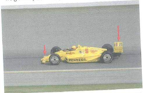 Shown in Fig. are the front and rear wings of an Indy racing car. These wings generate down force, which is the vertical downward force produced by the air moving over the car. Why is such a down force desired An Indy car can create a down force equal to twice its weight. Why not simply make the cars heavier      FIGURE Down force See Conceptual Question.