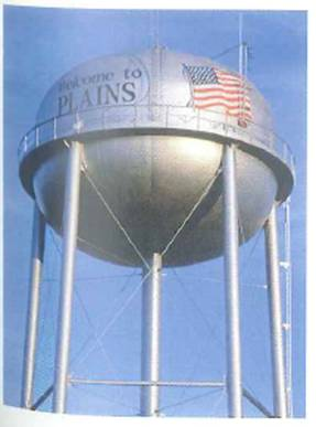 Water towers (storage tanks) are generally bulb shaped, as shown in Fig. Wouldn't it be better to have a cylindrical storage tank of the same height Explain.     FIGURE Why a bulb-shaped water tower See Conceptual Question.