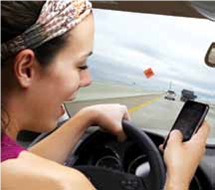 Texting: How Distracting Can It Be?  YouTube has videos of young adults texting while driving, and Facebook has a group called I Text Message People While Driving and I Haven't Crashed Yet! Many people are routinely texting while on the move, whether it's waiting in line for coffee, walking across the street, or driving. Is texting a big enough distraction to put people at risk of danger? The American College of Emergency Physicians believes so. They report that many people arrive in the emergency department with serious, sometime fatal injuries because they weren't paying attention to their surroundings while texting. Be honest-how many times have you been texting while driving and looked up only to be surprised you haven't been paying attention to the road? The dangers of texting while driving are so serious that 35 states and the District of Columbia have laws banning text messaging for all drivers. Though no state entirely bans the use of cell phones while driving, nine states and the District of Columbia ban drivers from using handheld cell phones while driving. It seems that the restrictions on using phones while driving will only become more strict. For instance, the Transportation Department has recently proposed guidelines aimed at disabling test messaging, Internet browsing, navigation destination entry, and phone dialing if the car is not in the Park position. The use of a cell phone in any way while driving increases the risk of an accident, and texting is more dangerous than talking. A driver's risk of getting into an accident is believed to increase sixfold when texting and fourfold when talking on a handheld cell phone. One study reported that texting increases the risk of a near-crash by up to 23 times. Another study found that cell phone use caused distractions comparable to those that occur while driving intoxicated.    Not only is texting distracting during our waking day, but for some, it can be a problem during sleep. Teens and young adults, in particular, go to sleep with their phones plugged in right by their beds. With every beep of a new text message, they awaken, disrupting their sleep and thereby affecting their cognitive and physical performance the next day. There have even been rumors of sleep texting-that is, texting during sleep only to discover in the morning the texts sent in the middle of night. The dangers of texting seem countless: injuring oneself or others, death, and tremendous embarrassment (who knows what you might text while asleep!). Question Why have you forgotten that you're driving while talking or texting?