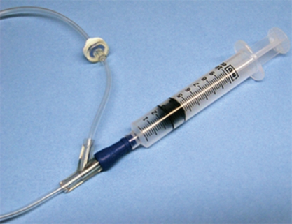 This is an example of a(n) _______________ syringe used to inject medication into an existing IV line.