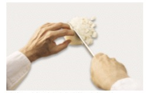 Identify the procedure shown in the picture. -  A)  Chopping mirepoix B)  Cutting parisienne C)  Cutting paysanne D)  Dicing