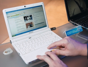 <strong> -The white computer in the accompanying photo is an example of a ____ computer.</strong> A) netbook B) tablet C) desktop D) smart phone