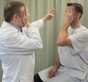 <strong>  The patient covers one eye. You place your hand with extended fingers behind the patient's field of vision and move your fingers toward the patient's field of vision. What assessment technique are you performing?</strong> A) Consensual response B) Confrontation test C) Test for accommodation D) Ocular mobility test <div style=padding-top: 35px> 