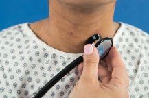   The nurse in the photo is auscultating the left lobe of the thyroid gland for a ________________.<div style=padding-top: 35px> 