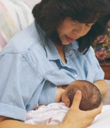 The nurse is teaching a postpartum client different holds for breastfeeding. Which of the following figures depicts the football hold frequently used for clients who have had a cesarean birth? A)    B)    C)    D)   