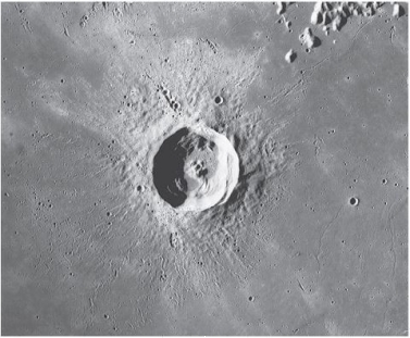 Consider the below image of a crater on the Moon.   Why would you <u>not</u> expect to see a similar landscape on Earth? Earth has ___________and___________ . A)  a much weaker atmosphere; is covered with regolith B)  a much stronger atmosphere; is <u>not</u> covered with regolith C)  a much stronger atmosphere; is covered with regolith D)  a much weaker atmosphere; is <u>not</u> covered with regolith 