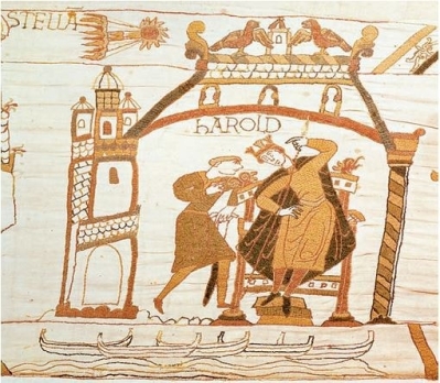The Bayeux Tapestry is pictured here:   Which astronomical event is featured in this picture? A)  an eclipse B)  the arrival of Haley's Comet C)  a supernova D)  collapse of a nebula 