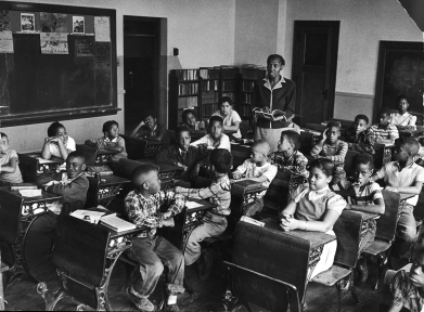 <strong>Until 1954, state-supported and sanctioned segregation along racial lines was completely legal, and school administrators often refused to allow black, Hispanic, or Asian American children to enter a school building. This is an example of ________. </strong> A) institutional racism B) color-blind racism C) group racism D) racial ideology