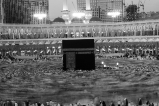 The Grateful Dead toured the country until the death of Jerry Garcia, the band's founder. They attracted a huge and devoted fan base, many of whom traveled long distances to see the band perform and partake of the hallucinogens commonly found at the concerts. What kind of religious practice might an anthropologist call such activity?   A)  pilgrimage B)  shamanism C)  ritual D)  rites of passage