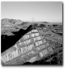 What is the ultimate control of the development of the landscape in the following picture?   A) climate B) human activity C) time D) relief