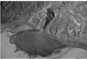 The image below of Death Valley,CA,shows a road that curves around a(n) ________.   A) delta B) alluvial fan C) turbidite D) glacial till
