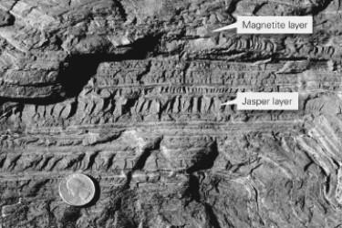 Consult the figure below.These iron ore deposits,which started as sedimentary layers,are known as ________.   A) banded iron formations B) jasper beds C) manganese nodules D) bauxite