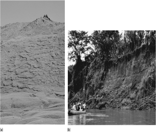 In the figure below,what about these two mass-wasting events is similar and what is different?   A) Both involve water,but mass-wasting event b could not have occurred in the mountains. B) Both occur in the mountains,but mass-wasting event a moved much faster. C) Both involve water,but the water is in two different phases. D) Both occur in the mountains but at two very different elevations.