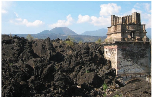 This figure shows the facade of the church of Paricutin,engulfed in a field of lava flows.Based on the texture of this basaltic lava,we can determine that it is __________.   A)  aa B)  tephra C)  pillow D)  pahoehoe