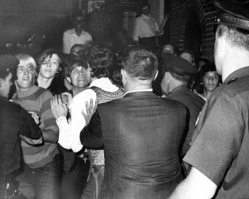 According to the textbook, what is generally regarded as the beginning of the battle for gay rights in the United States?   A)  the Stonewall Inn nightclub raid B)  California Proposition 8 C)  Lawrence v. Texas D)  the Texas sniper shootings