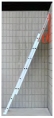 <strong>A 5.00-m long uniform ladder leans against a smooth wall and its base rests on a rough floor.The ladder has a mass of 18.0 kg and its base is a distance of 2.30 m from the wall.A person of mass 70.0 kg climbs 2.50 m up the ladder.Assuming the ladder is to remain in place,what is the magnitude of the force exerted on the ladder by the wall? </strong> A)249 N B)150 N C)224 N D)100 N E)300 N