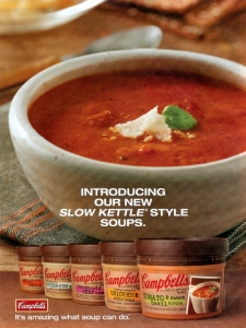   Campbell's Kettle Soup Ad -the Campbell's Kettle Soup ad above,Campbell's is introducing its new Kettle Style soups.What type of product advertisement is this ad? A)  reminder B)  pioneering C)  reinforcement D)  comparative E)  competitive