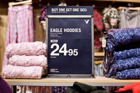 <strong> American Eagle Outfitters In-Store Signage Photo American Eagle Outfitters in-store signage photo above shows that customers can buy an American Eagle Outfitters hoodie for $24.95 and then purchase another one for 50 percent off (BOGO Deal A).Another BOGO deal (not shown above)offers consumers a markdown of 10 percent if they buy two hoodies (BOGO Deal B).In a third BOGO deal (not shown above),a retailer has marked down the price of hoodies from $24.95 to $22.95 per hoodie,so you'll consider buying two at that price (BOGO Deal C).BOGO deal #4 (not shown above)offers consumers the following terms: 5 percent off the first item and then 10 percent off the reduced price for the second item (BOGO Deal D).Finally,a fifth BOGO deal offers consumers the following terms: $10 off of all purchases of $40 or more (BOGO Deal E).Which BOGO deal offers the best value (least cost)to consumers for the purchase of American Eagle Outfitters hoodies?</strong> A) BOGO Deal A B) BOGO Deal B C) BOGO Deal C D) BOGO Deal D E) BOGO Deal E
