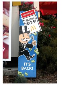     -As shown in the McDonald's Sales Promotion Image above, McDonald's partners with Hasbro each year to offer a Monopoly sales promotion. Customers who purchase selected menu items receive two tokens that correspond to the properties on the popular game board. If a set of tokens matches the color-coded properties, customers will win cash prizes of up to $1 million. Customers may also win  Instant  prizes redeemable for specific food or drink items. What is this popular sales promotion called? A) a lottery B) a contest C) a premium D) a sweepstakes E) a deal