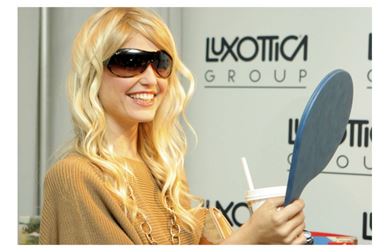   -Ralph Lauren has a long-term __________ agreement with Luxottica Group, S.p.A. of Milan for the design, production, and worldwide distribution of prescription frames and sunglasses under the Ralph Lauren brand. The agreement is an ideal fit for both companies. Ralph Lauren is a leader in the design, marketing, and distribution of premium lifestyle products, while Luxottica is the global leader in the premium and luxury eyewear sector. A) brand licensing B) generic branding C) multiproduct branding licensing D) mixed branding E) co-branding