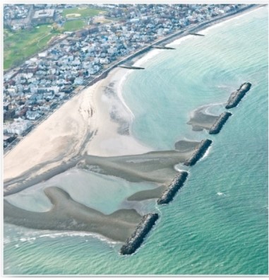   Which are these features that create zones of still water near coastlines? A) Breakwaters. B) Groins. C) Jetties. D) Tombolos.