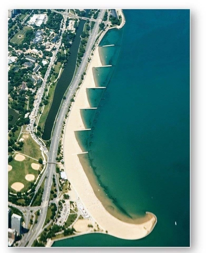 <strong> These features on the shore of Lake Michigan disrupt sediment movement along a coast.</strong> A)Breakwaters B)Groins C)Jetties D)Tombolos