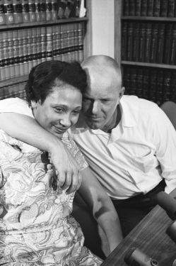 The Lovings embrace in this photograph,celebrating the Supreme Court decision that,in Loving v.Virginia (1967) ,struck down America's ________ laws.   A)  Jim Crow B)  racial purity C)  antimiscegenation D)  exogamy