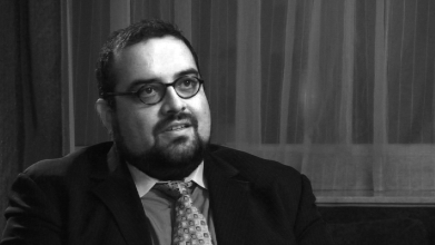 Dr.Shamus Khan studied one of the most elite boarding schools in the nation.Suppose that graduate student Kia Darby replicates Dr.Khan's methodology in her study of public schools in Appalachia.Kia:   A)  gathers statistical data from archives. B)  compares three schools from the same region. C)  becomes a teacher at a public school in Appalachia. D)  sends a survey to district superintendents in the region.