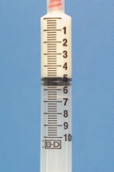 Identify the dosage measured on the syringe.  