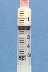Identify the dosage measured on the syringe.  