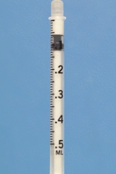 Identify the dosage measured on the syringe.  
