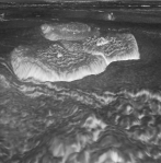 Which world has dome-like structures like those shown in the image below?   A)  Venus B)  Mars C)  Mercury D)  Titan